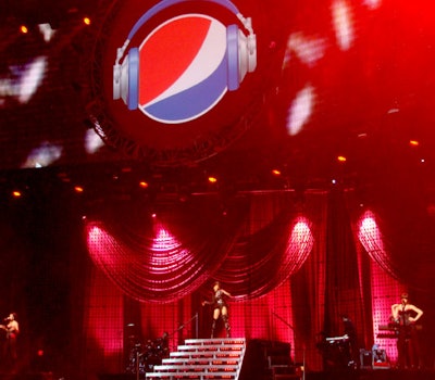 Theatrical draping and beaded curtains adorned the stage during Rihanna's performance.