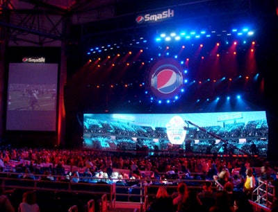 The Pepsi Smash Super Bowl Bash concert continued as schedule at the Ford Amphitheater in Tampa last night despite the continual rain.