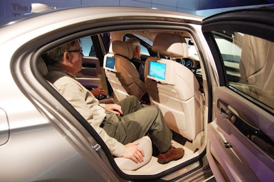 Participants had the opportunity to sit inside the vehicle, which includes optional features such as an active blind spot detection system, night vision, and a DVD player.