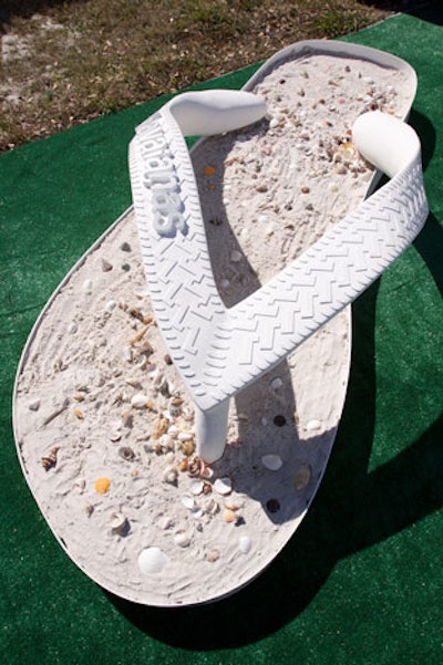 Havianas' presence at the Marquis Jet and NetJets party included a giant flip-flop, and guests could customize their own pair.