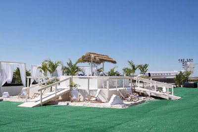 After sponsoring the Audi Forum in 2008, Marquis Jet and NetJets this year hosted their own daytime party, dubbed 'The Hangar at Tampa Bay.' Headed up by Tony Berger of New York-based Relevent, the look of the Saturday party for 1,600 was based on the idea of 'Margaritaville meets the W Hotel.'