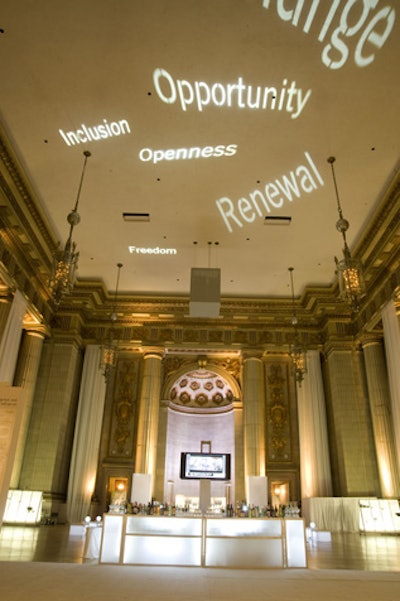 To channel the new president's message, campaign buzzwords shined on the auditorium ceiling.