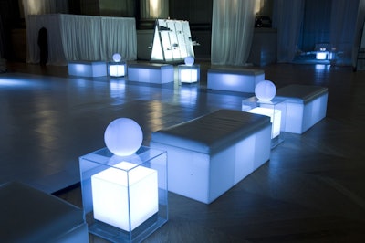 Glowing poof chairs and bubble sofas from New York-based Form Decor punctuated the monochromatic space.