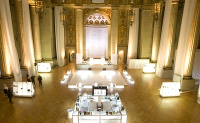 Sygyzy Events created the all-white setting at the Mellon with help from Digital Lightning to symbolize a fresh start with President Obama.