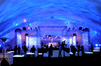 LA-based Felix Lighting washed the 20,000-square-foot tent with purple and cool blue lighting.