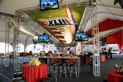 Produced by Angel City Design's Mark Yumkas, the NBC Sunday Tailgate party's open-air tent featured a six-sided spider truss.