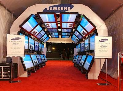 Celebs arrived via Samsung's signature 26-foot tunnel of 40 flat screen TVs.