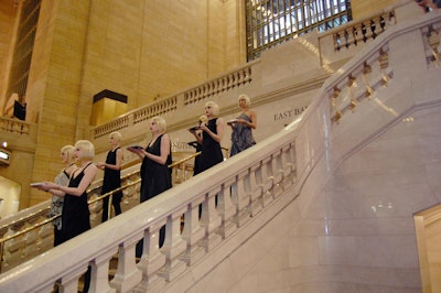 Choreographer Johnny Byrne gave the models a catalog of poses to strike with the laptops as well as a few synchronized routines.