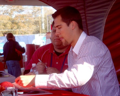 NFL players like quarterback Matt Cassel stopped by the Experience throughout the weekend to sign autographs.