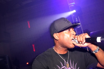 Talib Kweli performed on stage at the Friends and Family party.