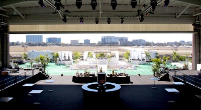The day prior to Club 009, the airplane hangar hosted the Marquis Jet and NetJets event, which featured a similar floor plan though with different signage.
