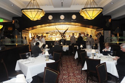 The restaurant's main dining room features an open kitchen and can seat approximately 120 guests.