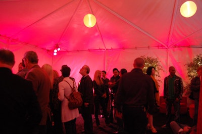 Lanterns hung in the cocktail tent and white lights twinkled on trees.