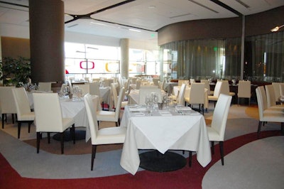 The 126-seat main dining room has two olive-shaped tables for eight.