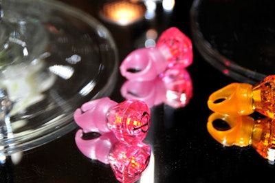 Guests found keepsake plastic rings on each table.