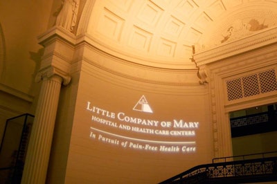 A gobo over the museum's main staircase showcased the hospital's name.