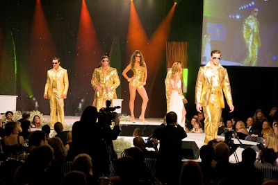 In a scene inspired by the '70s, models walked the runway dressed in gold fashions created by Farley Chatto following a performance by Liberty Silver.
