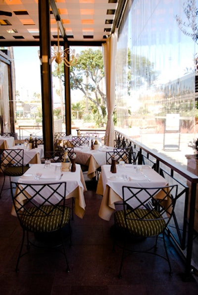 The patio provides shade and ample dining space.