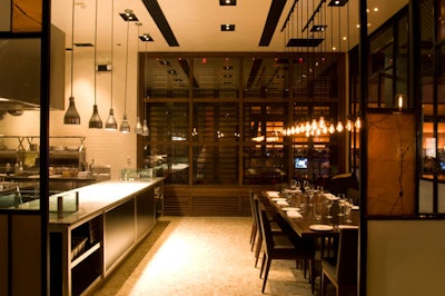 An open kitchen gives diners a peek at the chefs at work.