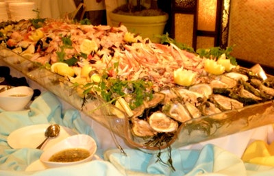 The seafood bar consisted of crab claws, shrimp, raw oysters, and more with accompanying sauces.