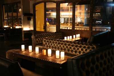 A lounge area sits near the entrance of Barbarella Bar.