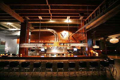 The main bar is adjacent to the dance floor and has seating for 45.