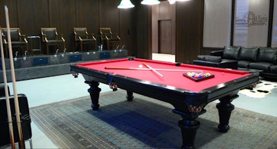 John Allan's lounge area features a pool table, bar, and DJ area.