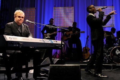 Elton John performed onstage with Raphael Saadiq.