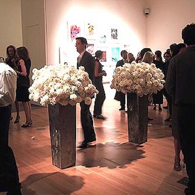 Large white floral arrangements also dotted the galleries.