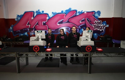 Graffiti decorated the wall behind the registers.