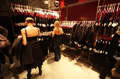 Clothing stalls around the perimeter of the main room held racks of the McQ collection.