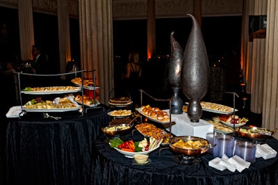 Bronze sculptures served as centerpieces on the buffet tables.