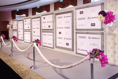 For arrivals, Caravents gave the step-and-repeat wall a silvery picture-frame motif.