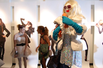 In addition to the photography, the afternoon presentation for Alice & Olivia also featured six mannequins loaded with props like lunch boxes, instruments, magazines, and teddy bears.