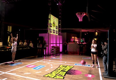 Actress Eliza Dushku kicked off her heels to participate in the shootout, held on a custom-designed T-Mobile myFaves half-court