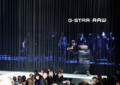 Two classical pianists supplied the music for the G-Star show, playing behind a sheer black curtain that functioned as the runway backdrop.