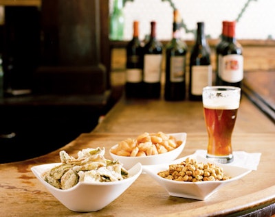 From left: crispy artichoke chips in the Samuri bowl from Classic Party Rentals in New York; salted, dried lychees in the teardrop bowl from Classic Party Rentals in San Francisco; and split pea mix with bacon in the Origami bowl from Hall's Rental in Chicago. All snacks are from Mary Giuliani Catering and Events in New York.