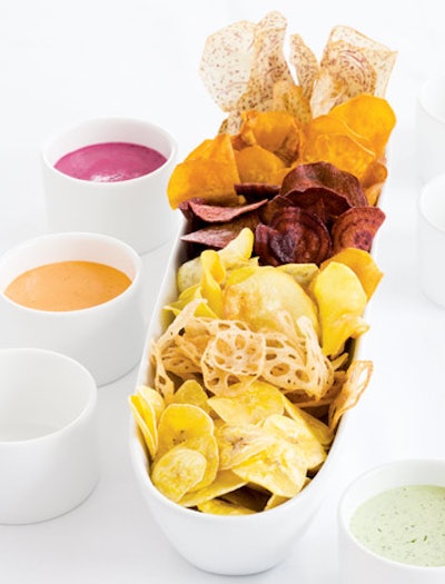 Root vegetable chips with chipotle, beet, and green herb dips from Marigolds & Onions in Toronto