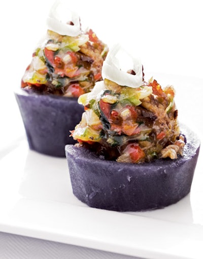 Purple potatoes filled with spicy carnitas from R&R Catering in Washington
