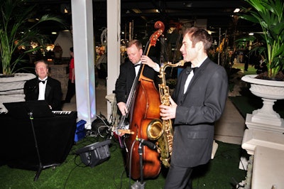 The Graham Howes Band performed for guests in a garden setting.