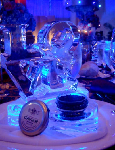 Each of the 825 table settings was topped with a personal ice sculpture that held the first course, caviar.