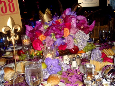 In an effort not to obstruct views of the stage, many of the tables held low-lying centerpieces.