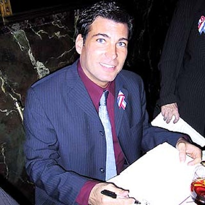 David Tutera signed books at the launch party for his new book, A Passion for Parties, at Cipriani 42nd Street.