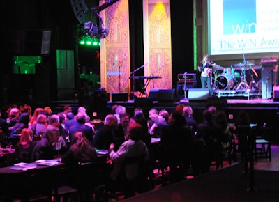 Large panels surrounded a screen onstage.