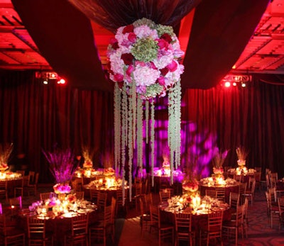 Custom-made floral-encrusted globes were suspended from the ceiling inside the Four Seasons' grand ballroom.