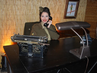 Models dressed in 1940s military attire added to the South Pacific ambience.