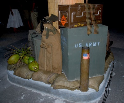 Ammunition boxes and U.S. ARMY-branded decor were used on the military side of the event space.