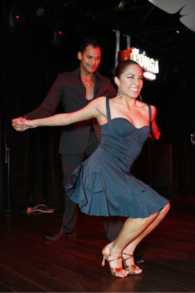Salsa dancers mesmerized the crowd with their exotic moves.
