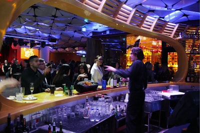Guests enjoyed signature cocktails mixed at the sculptural Papaya Bar.