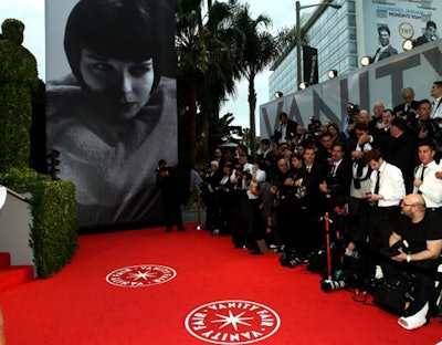 The red carpet took over the hotel's driveway, and was accented by Oscar-shaped hedges and oversize images from Vanity Fair's Lacma exhibit.